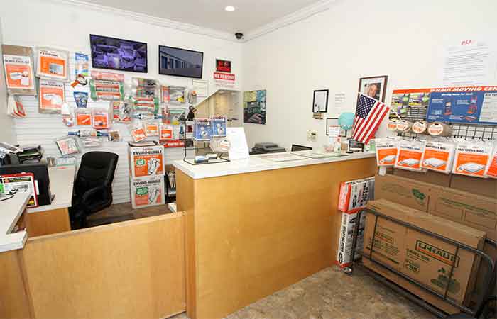 Storage lobby with packing supplies for sale.