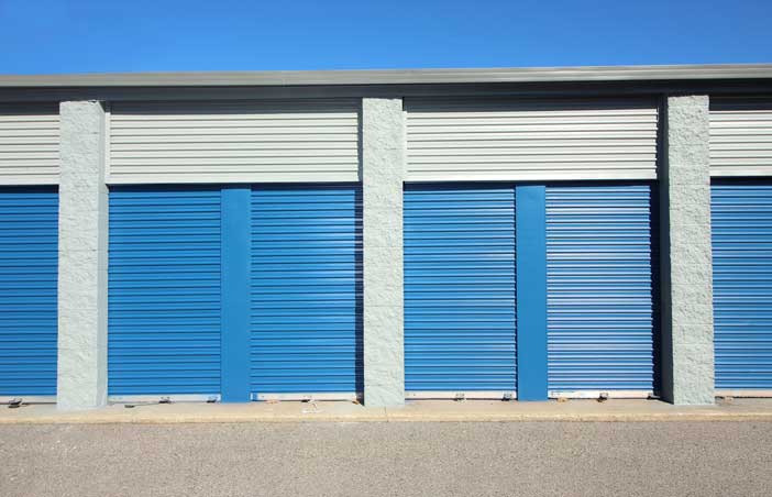 Small drive-up storage units with easy access.