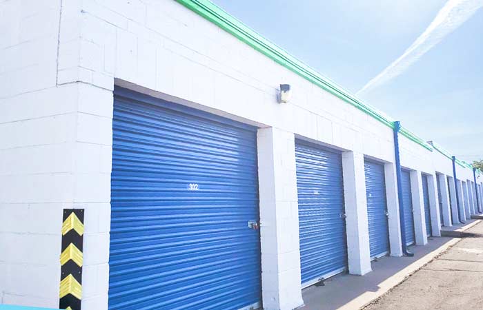 Drive-up storage units with roll-up doors.